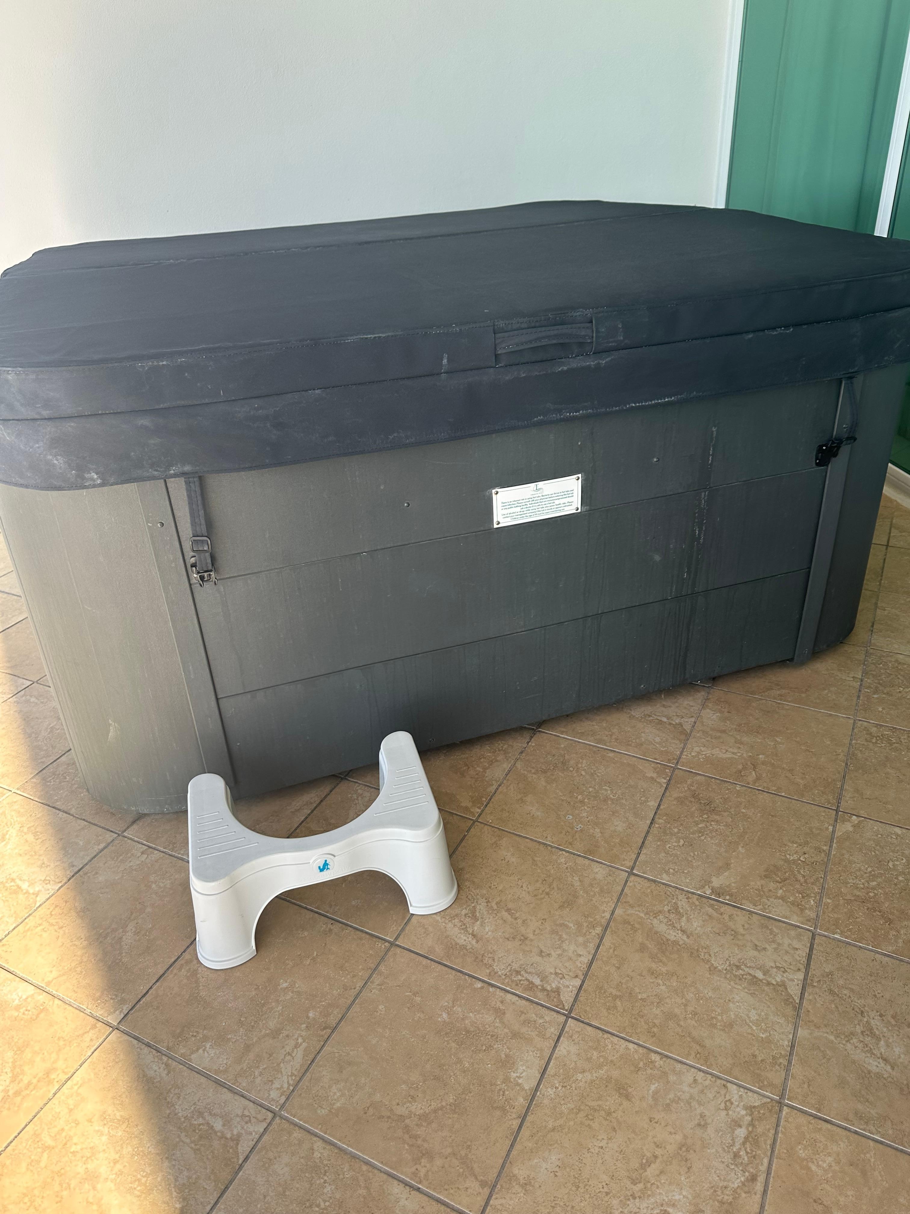 Gross “squatty potty” from toilet to access hot tub. This violates ADA regulations 