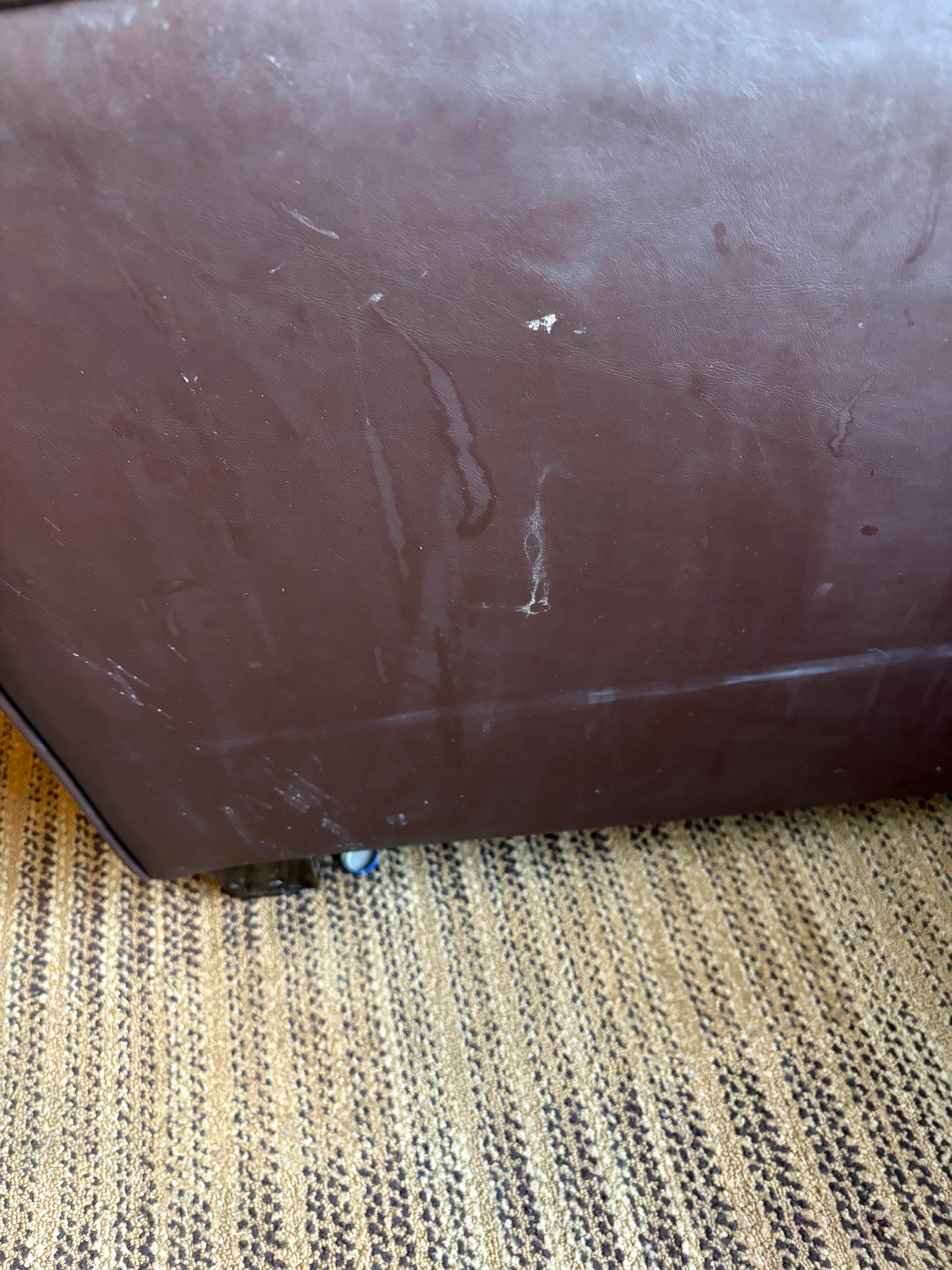 Disgusting filth on chair in room with beer cap 