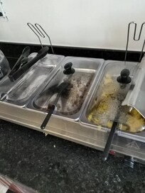 Dried out old food still on the counters at 3:30pm.