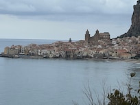 Cefalu Cathedral on a semi-cloudy day.