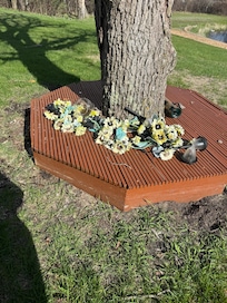 Broken solar lights, flowers, vases