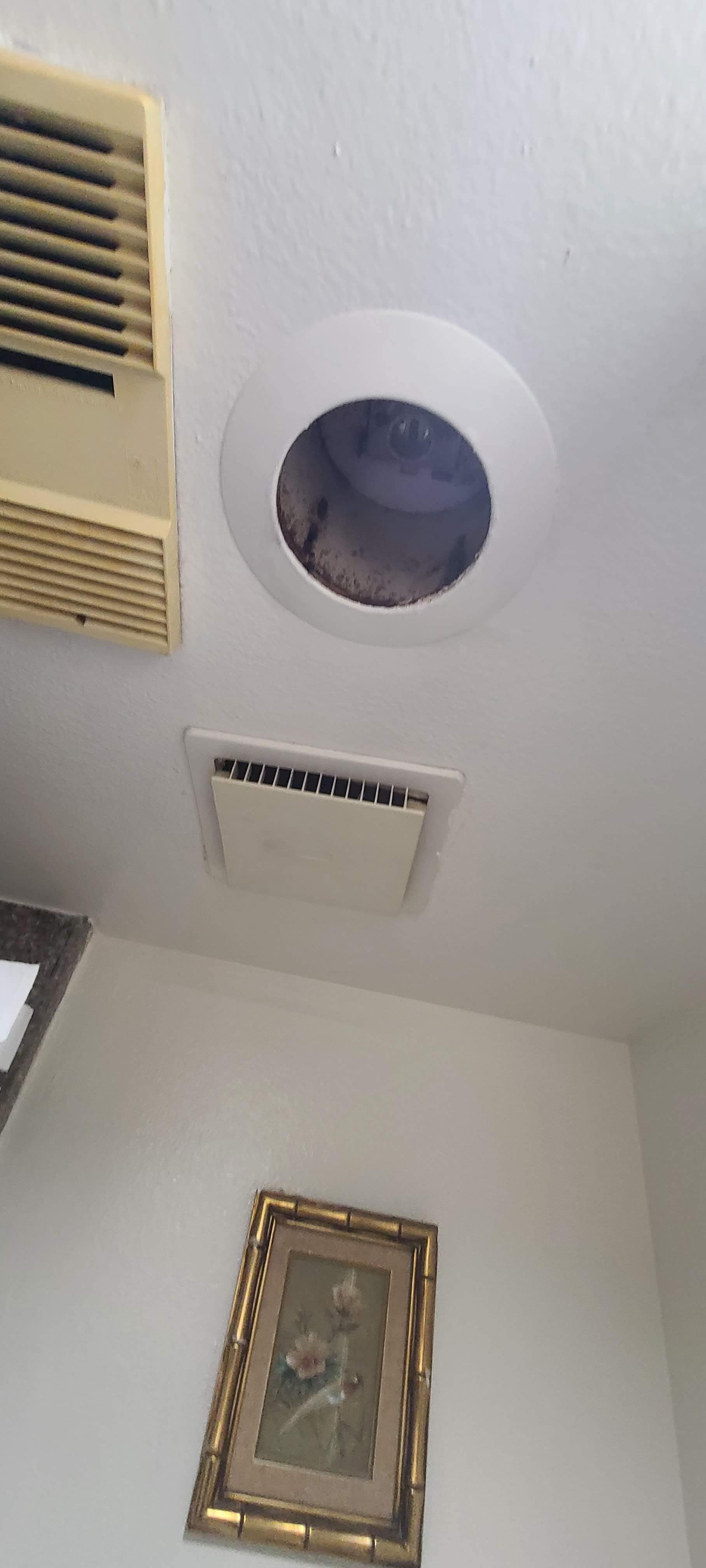 hole in bathroom ceiling