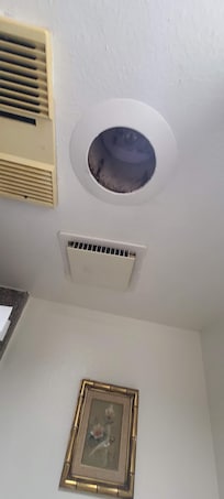 hole in bathroom ceiling