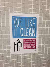 This sign hangs above the toilet, but clearly they don't clean well