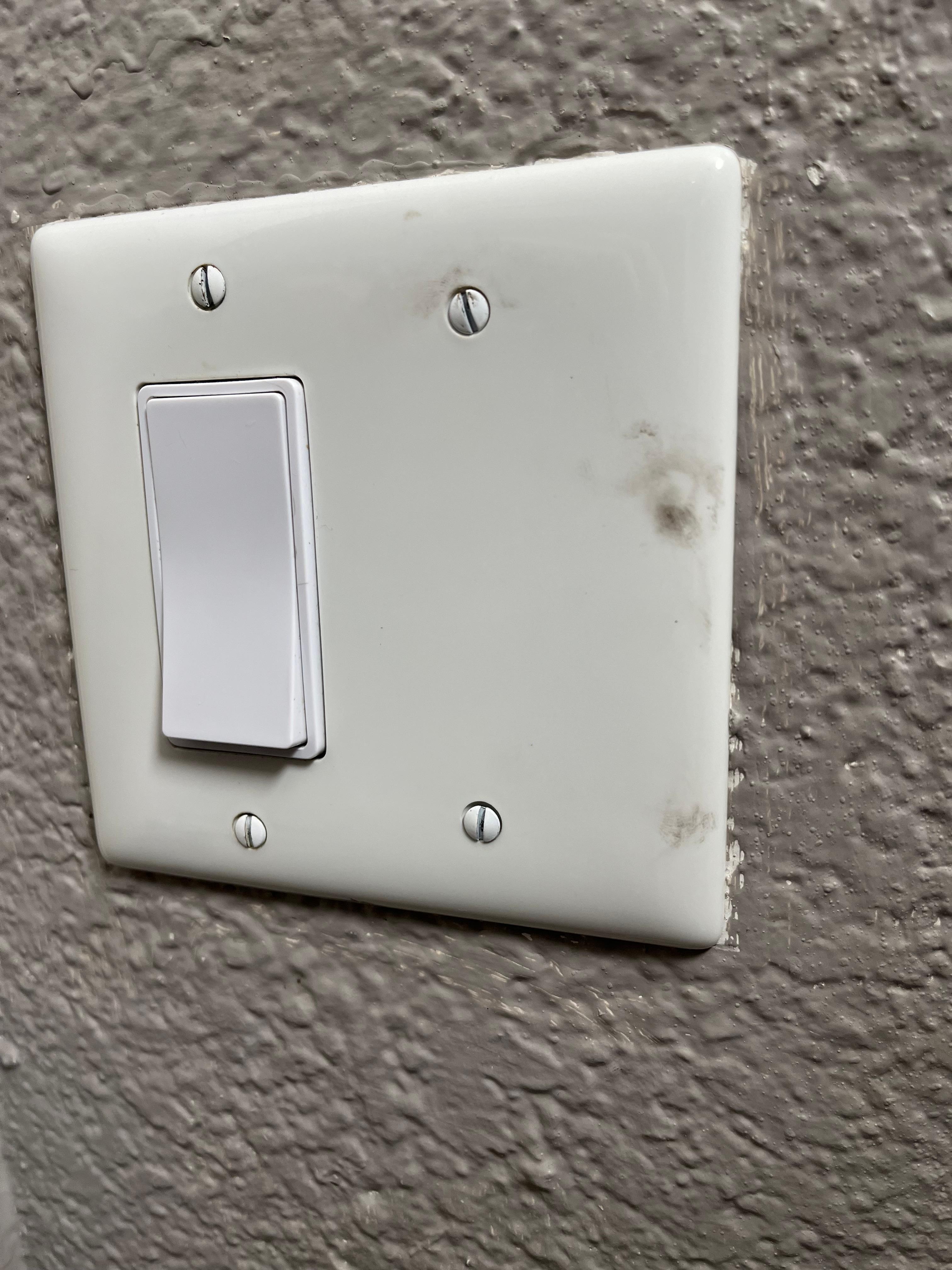 Dirt or burn marks on switch