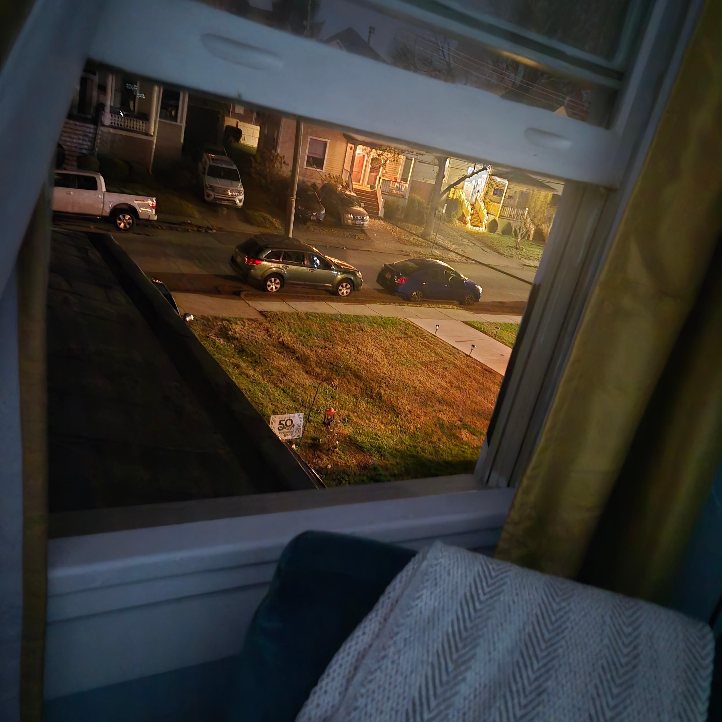 The living room window opened but didn't have a screen.