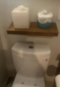 Shelf was slanted it was loose and hanging off the wall