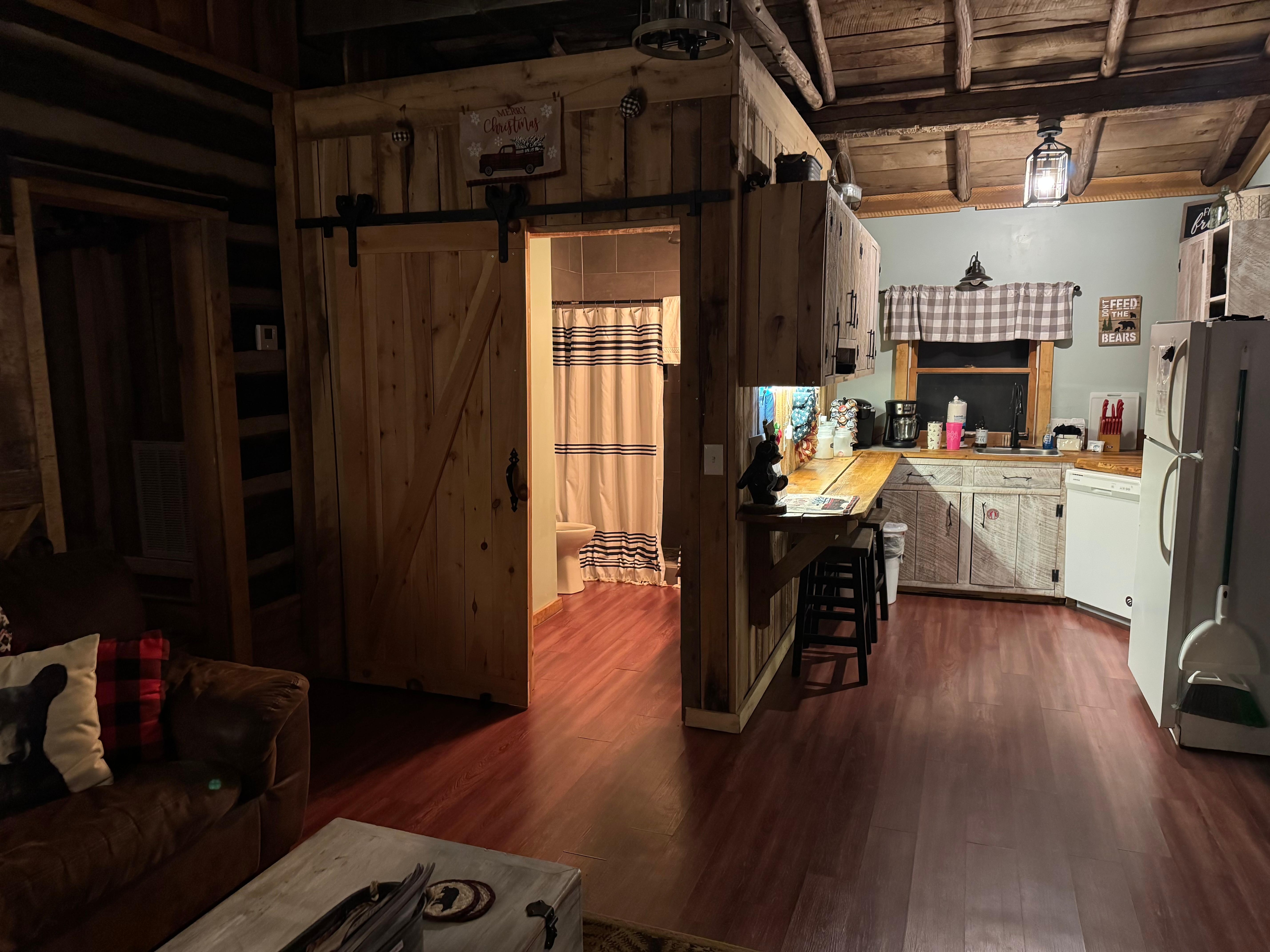 Kitchen and bathroom area. Nice kitchen gadgets.