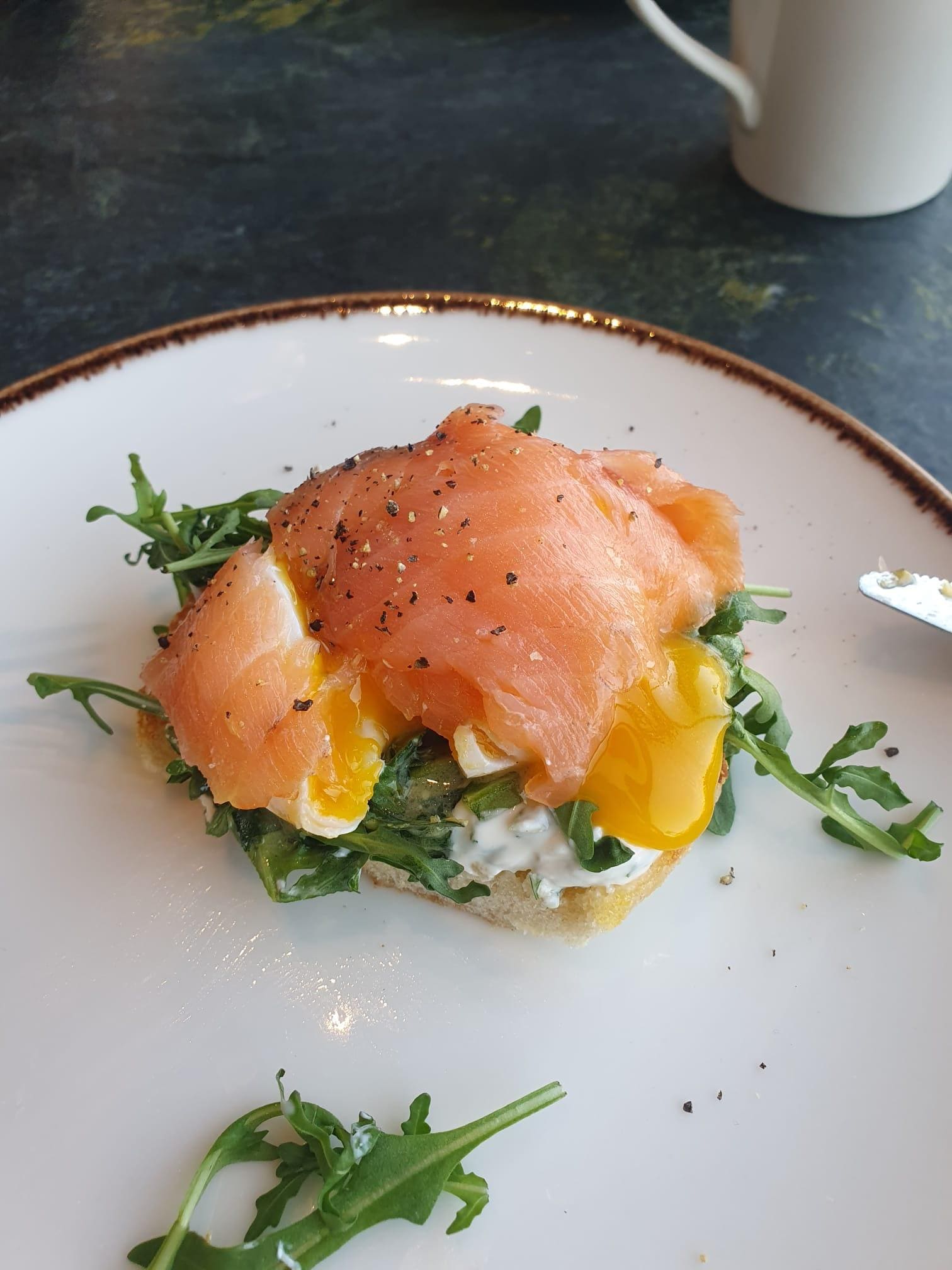 Freshly prepared Eggs Royale for breakfast.