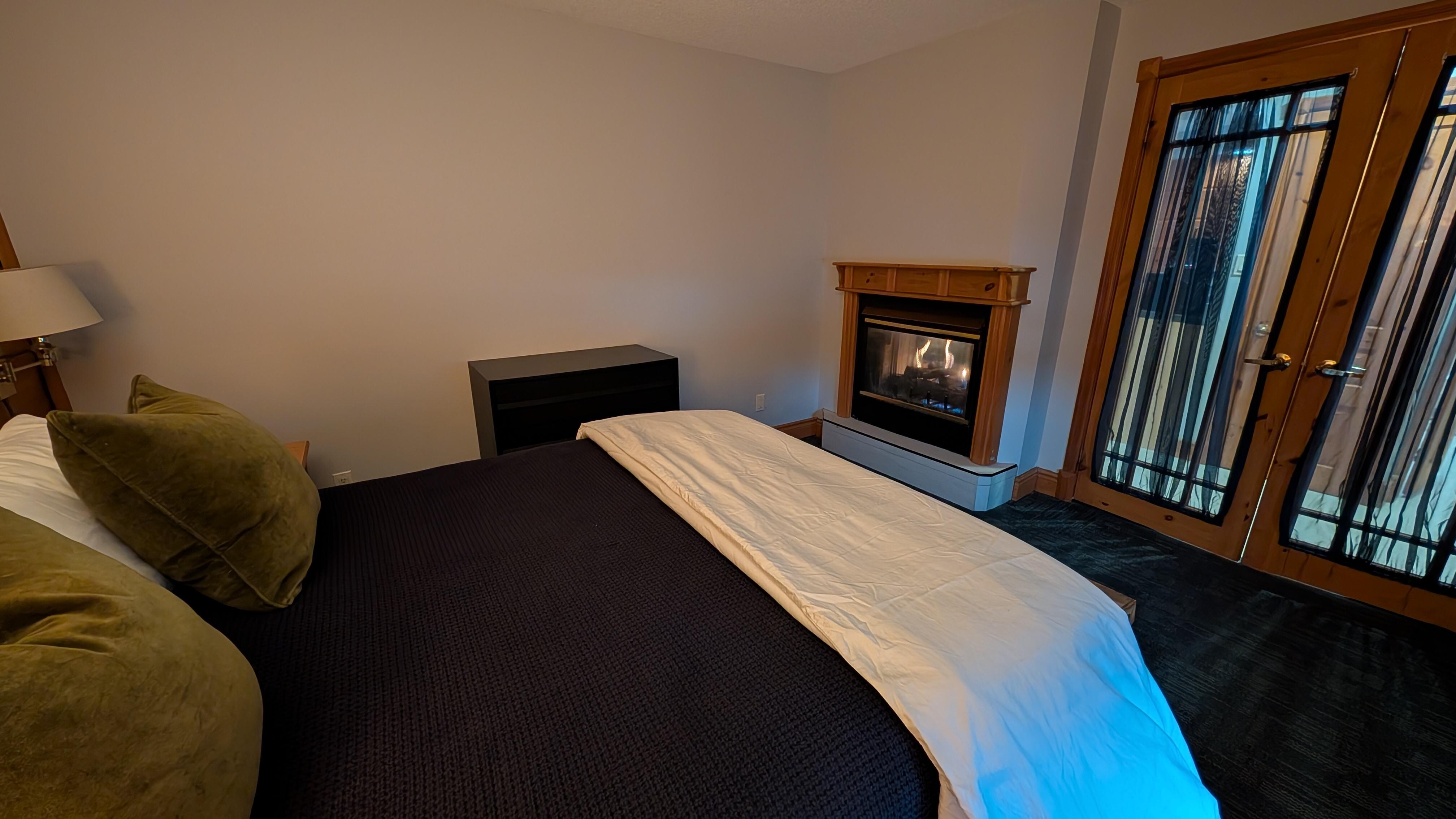 Bedroom with fireplace.