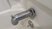 Diverter spout barely hanging on, flange loose meaning water running in behind the tub (watch out Room 149 below) and diverter pull barely sends water to the shower head.