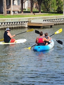 Kids kayaking and paddle board