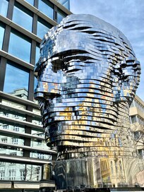 The Head of Franz Kafka, also known as the Statue of Kafka, is an outdoor kinetic sculpture by David Černý depicting Bohemian German-language writer Franz Kafka, installed on 31. October 2014 .