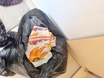 Had to gather owners clothes in a wardrobe and put in bag