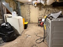 Laundry facilities resemble a construction zone