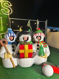 Three friends enjoying the lights