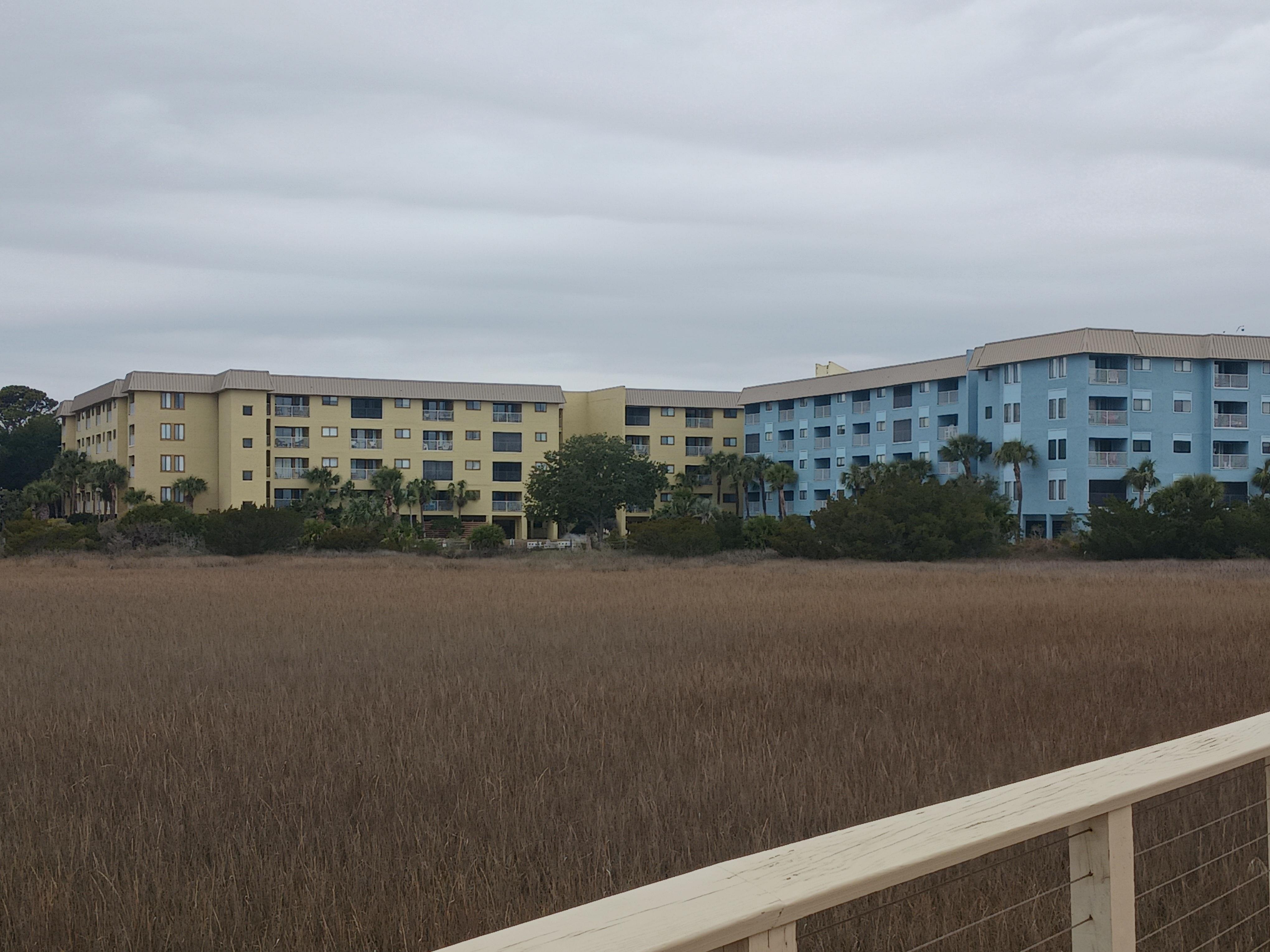 View of complex from boardwalk. Condo is in yellow building 