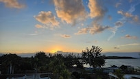 A sunset view from the terrace that will make you sad to leave, but excited to come back.