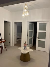 Very spacious, this room was open to bedrooms and two bathrooms