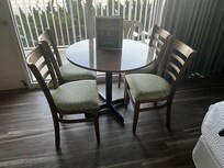 Oceanfront balcony. Cute table and chairs inside.