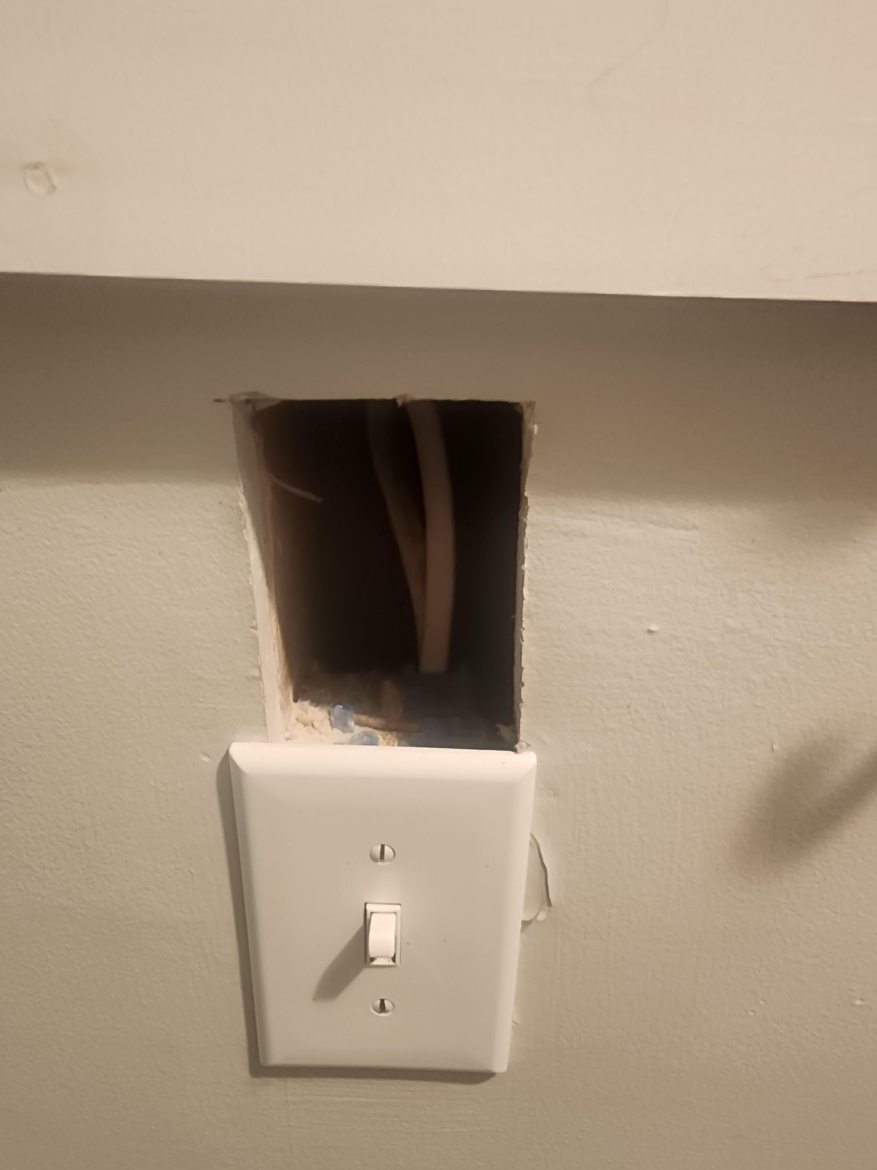 Another hole at an electrical outlet