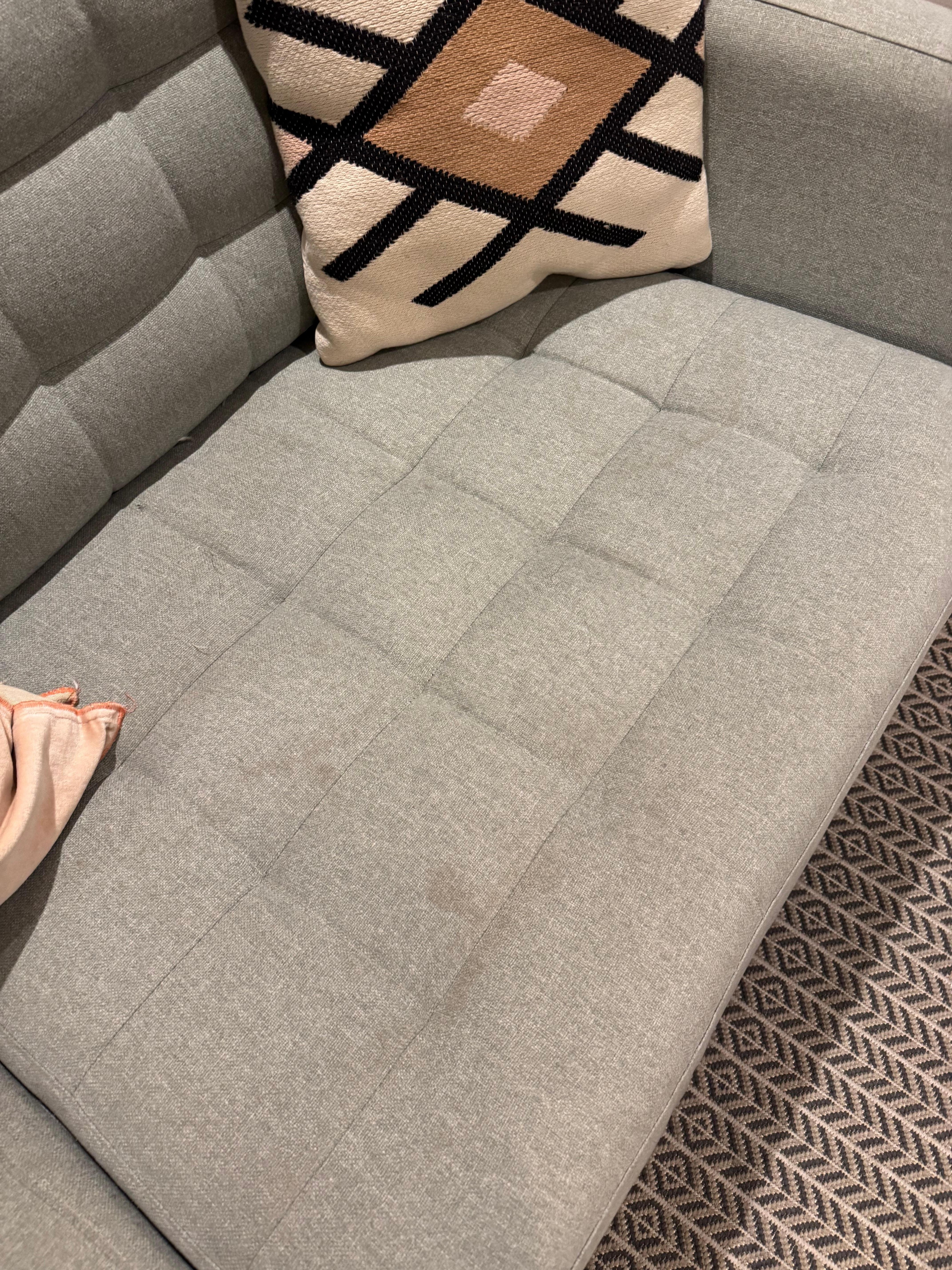 Tired stain on the couch. 