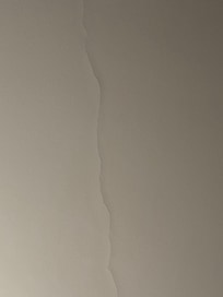 a major crack running across the ceiling