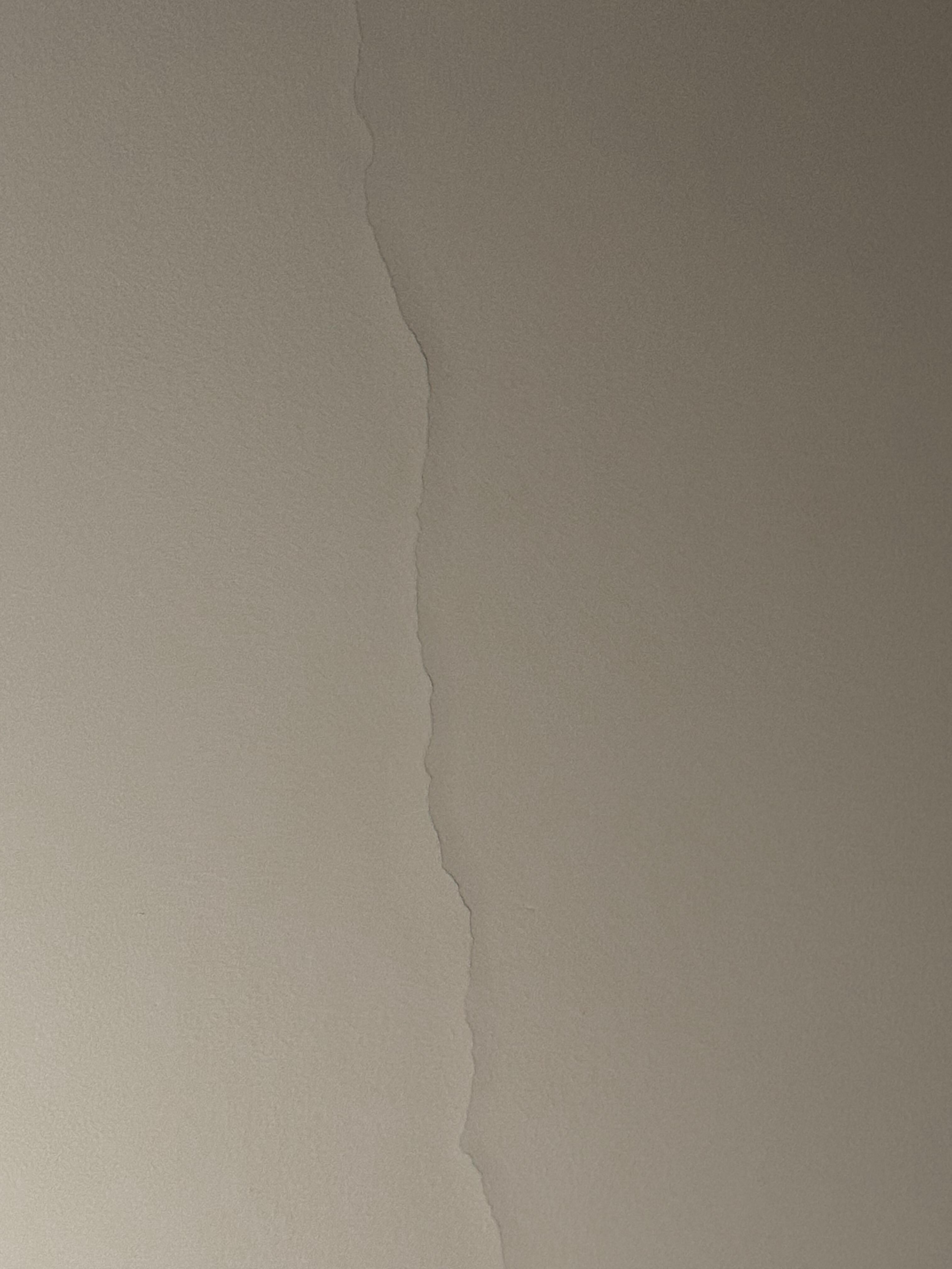 a major crack running across the ceiling