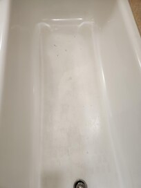 Bath tub is dirty.