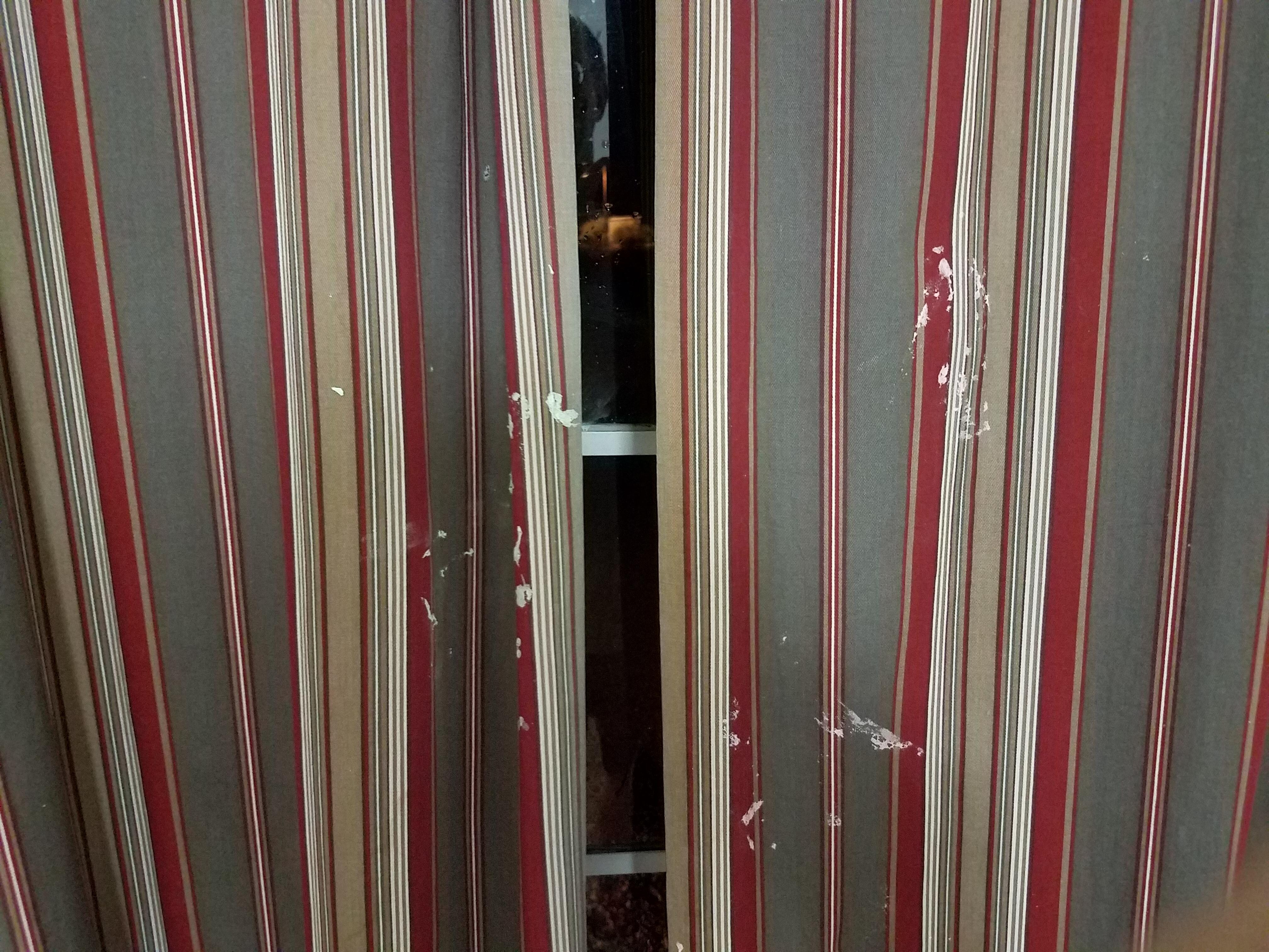 Paint splatters on curtains