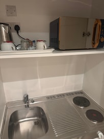 Forgot to take a pic but there was also a small fridge/freezer below this and plenty of storage room for clothes