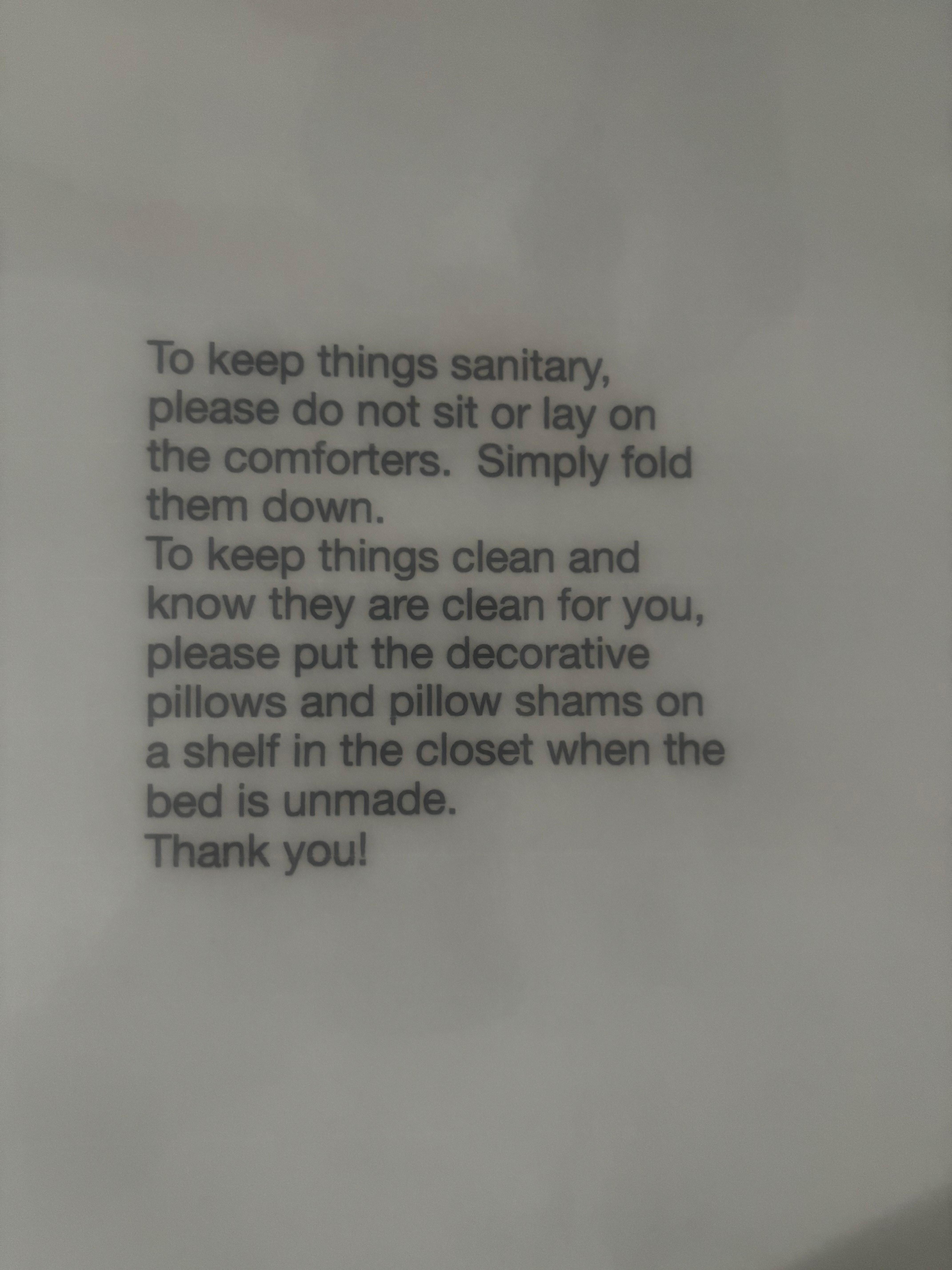 Strange cards on beds left by property owner. 
