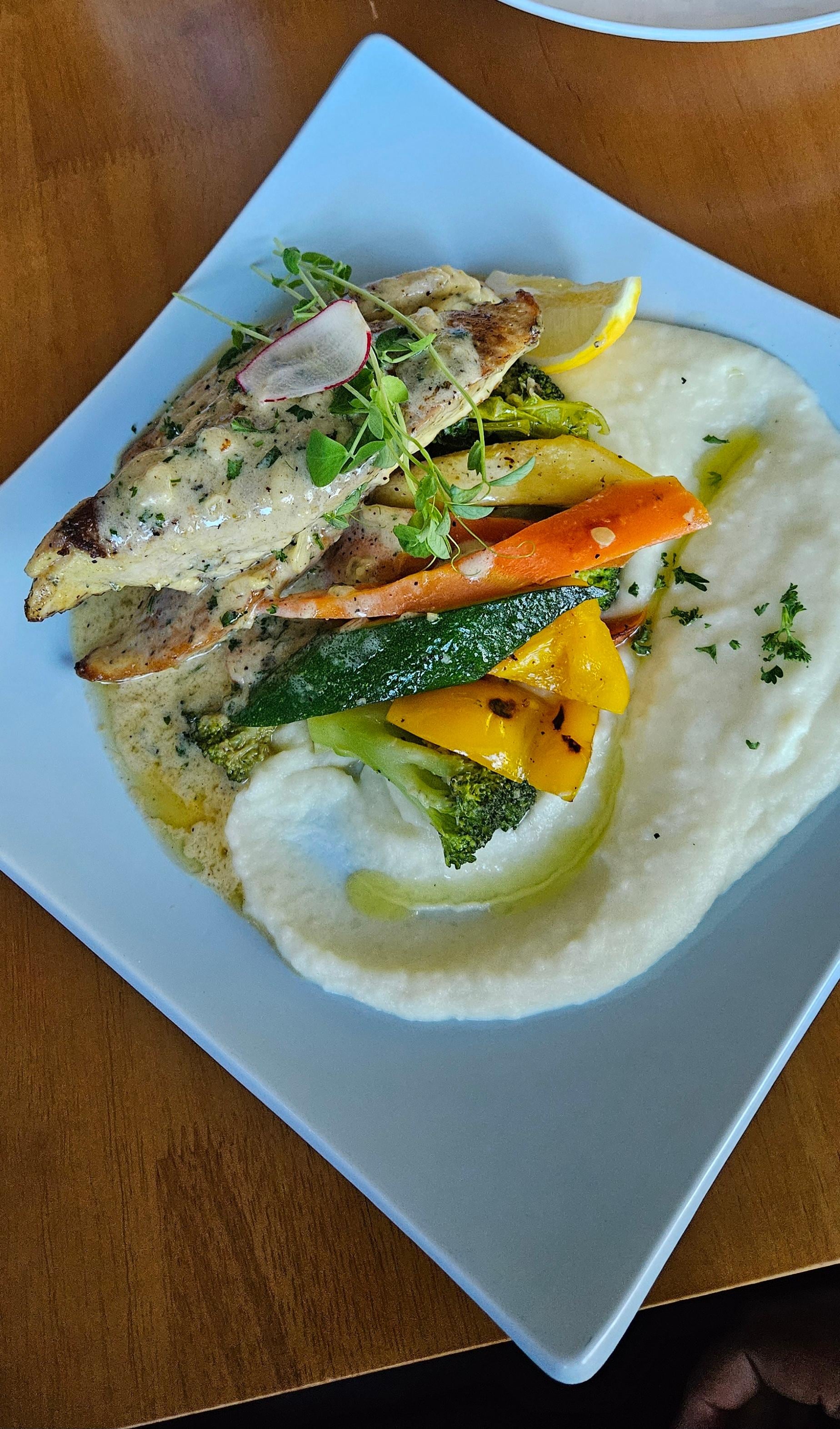 Snapper with fresh veggies and creamy mash potatoes. Delish! 