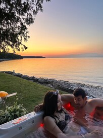 My daughter & her bf in hot tub & neighbors would come by hot tub or return kayak to spot next to hot tub.