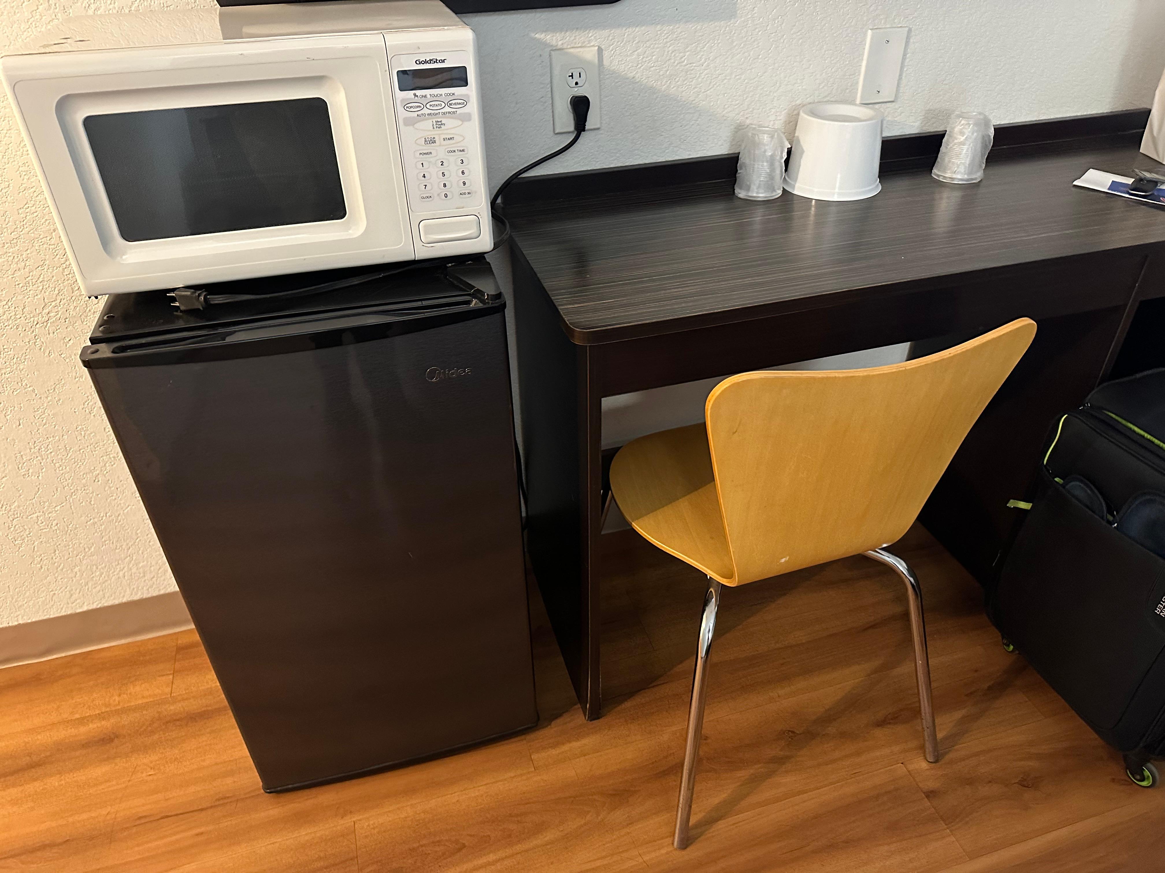 Microwave, fridge and functioning desk