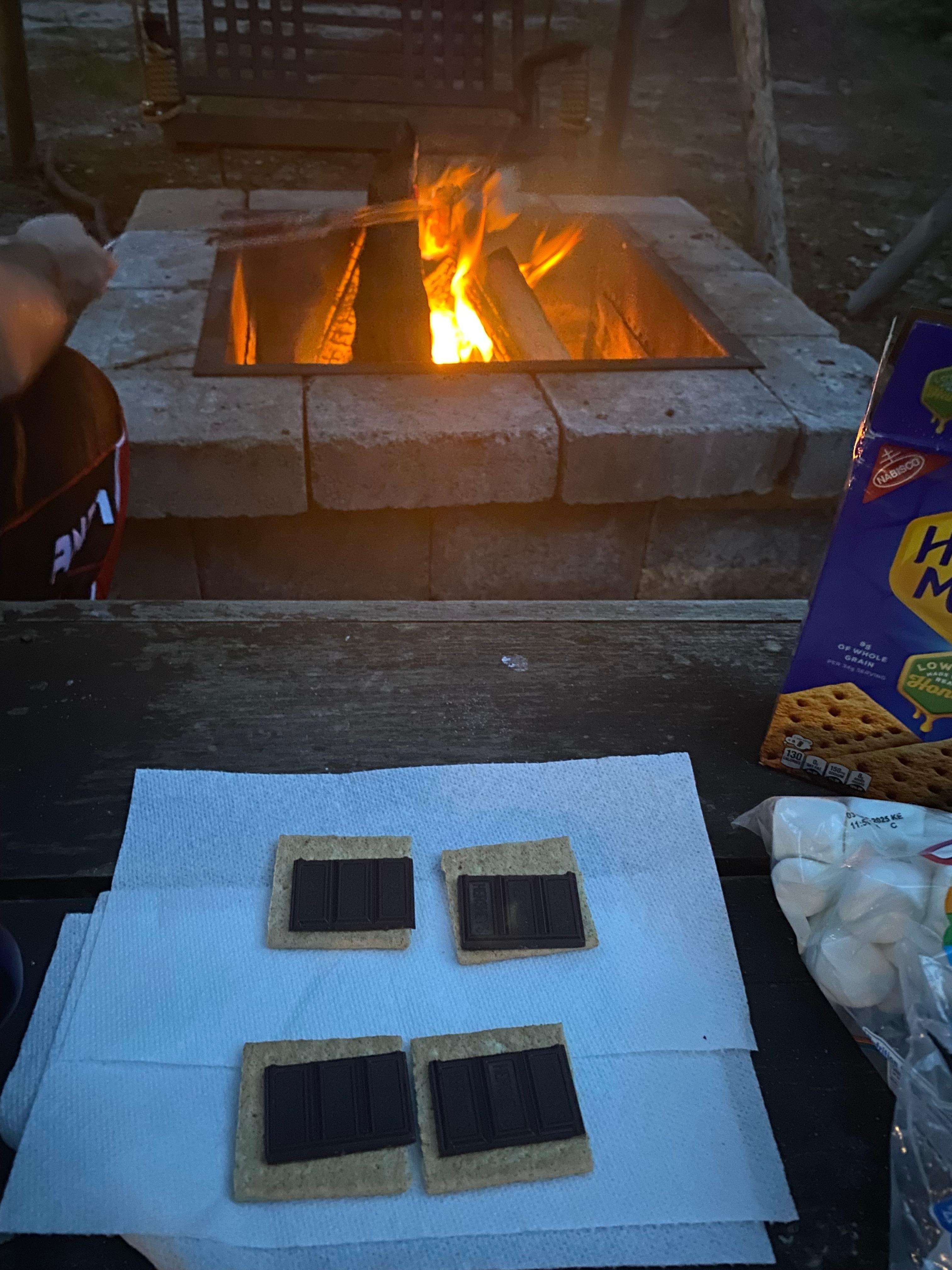 Making s’mores by the fire pit