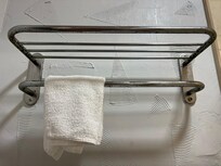 Rust covered towel rack