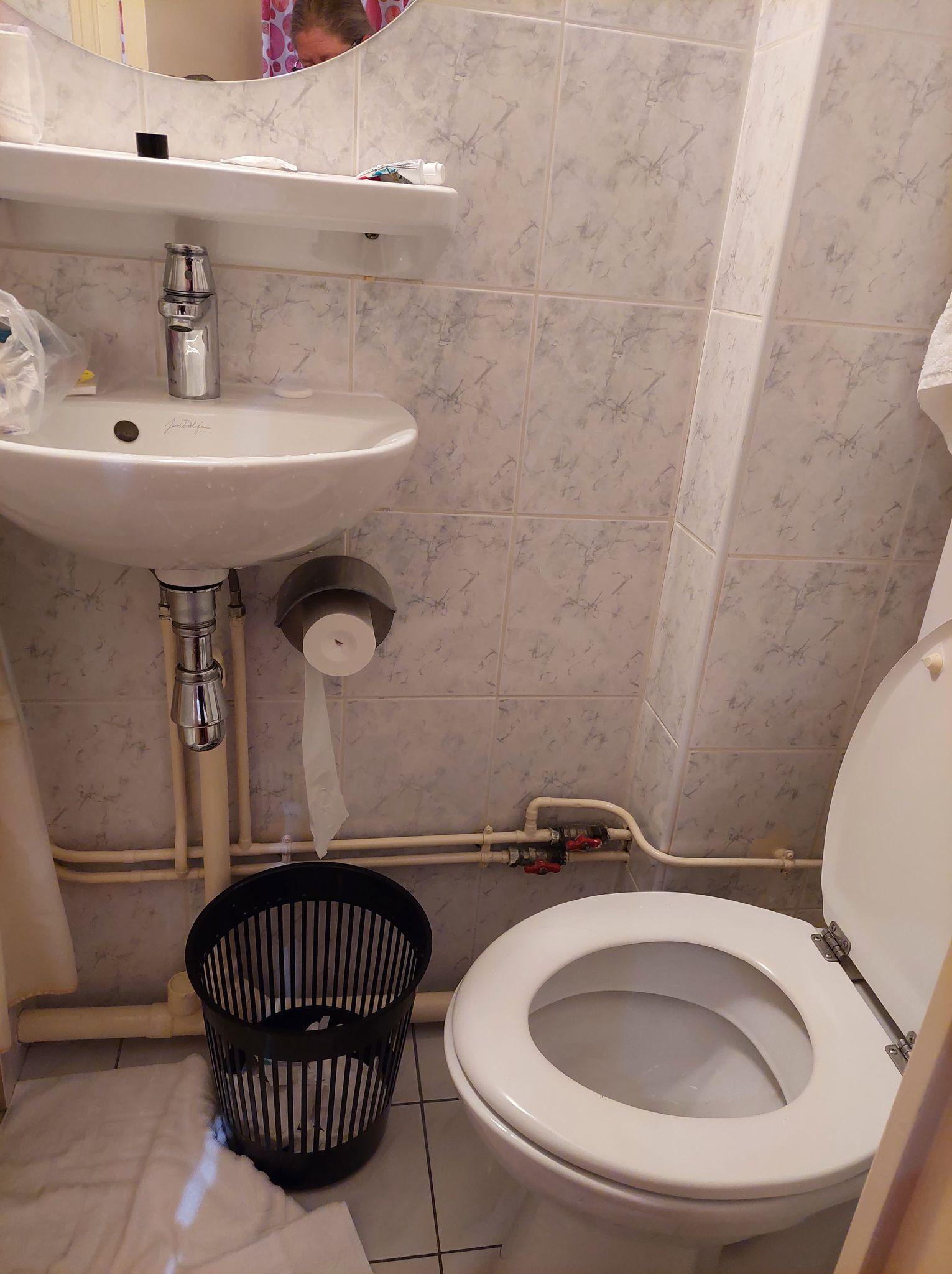 Very small but clean Toilet/bath