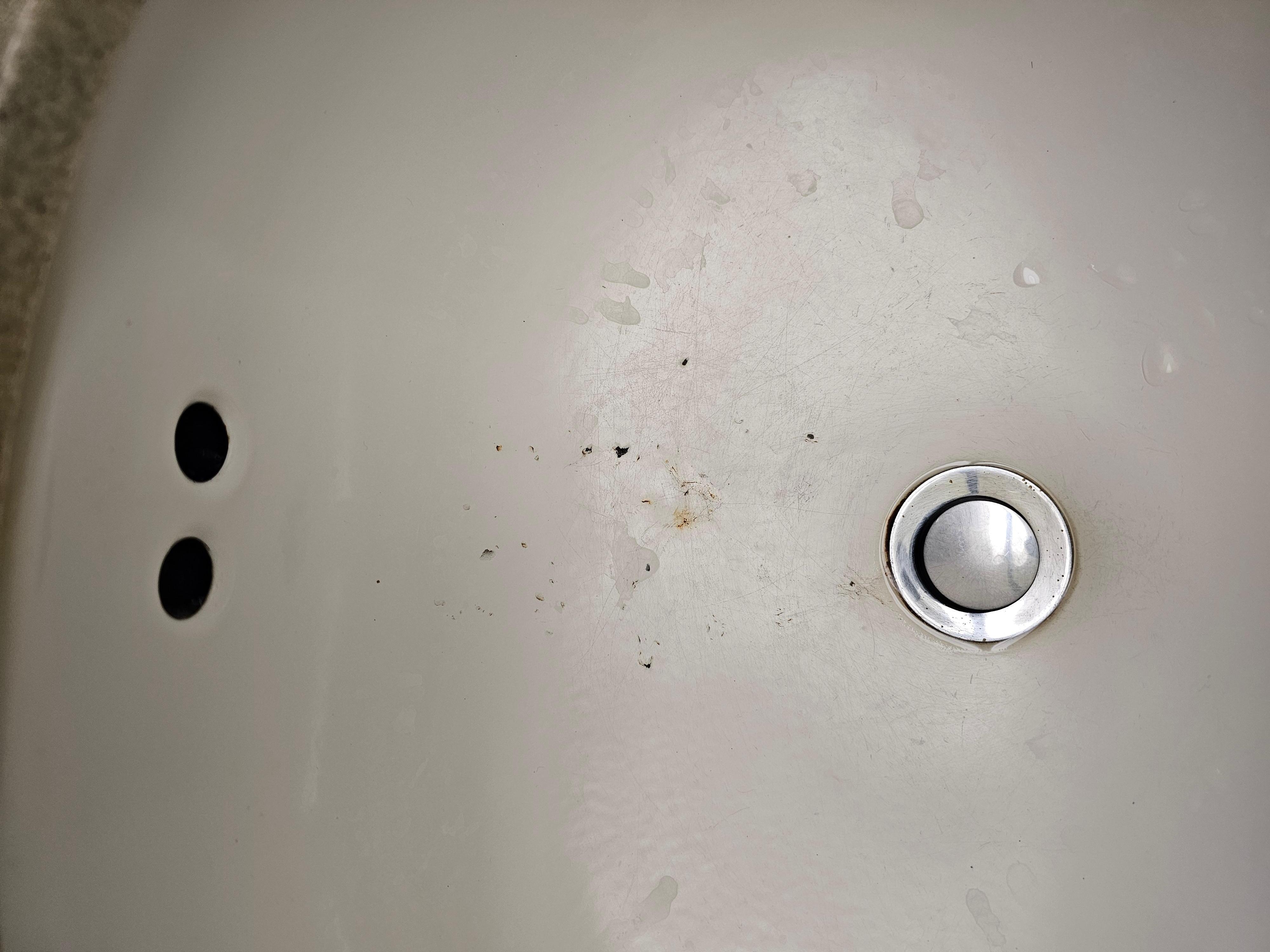 Rust and chips in sink 