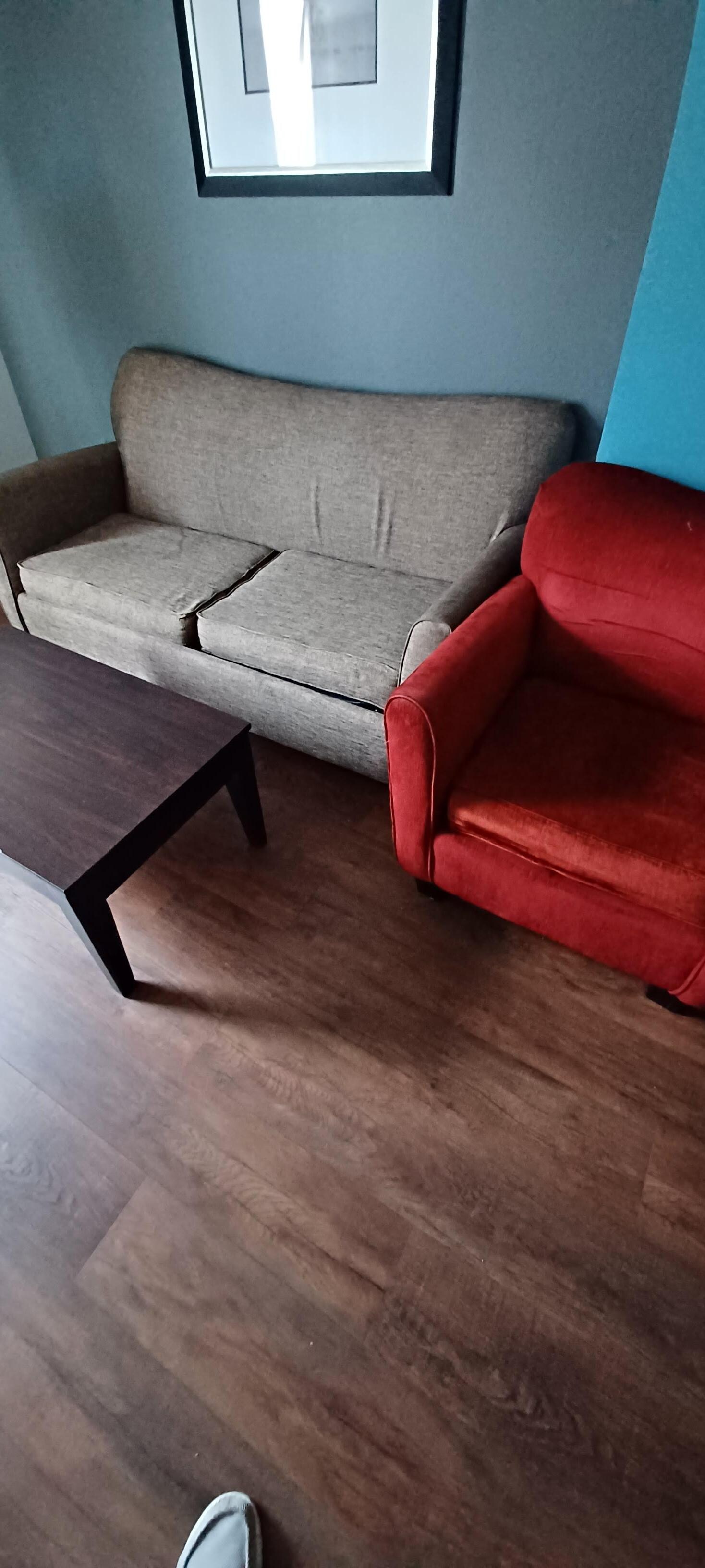 Sofa was "broken down".  Extremely uncomfortable to sit on.

Hard to believe this is classified as a suite. You sure didn't mind charging us at a suite rate.