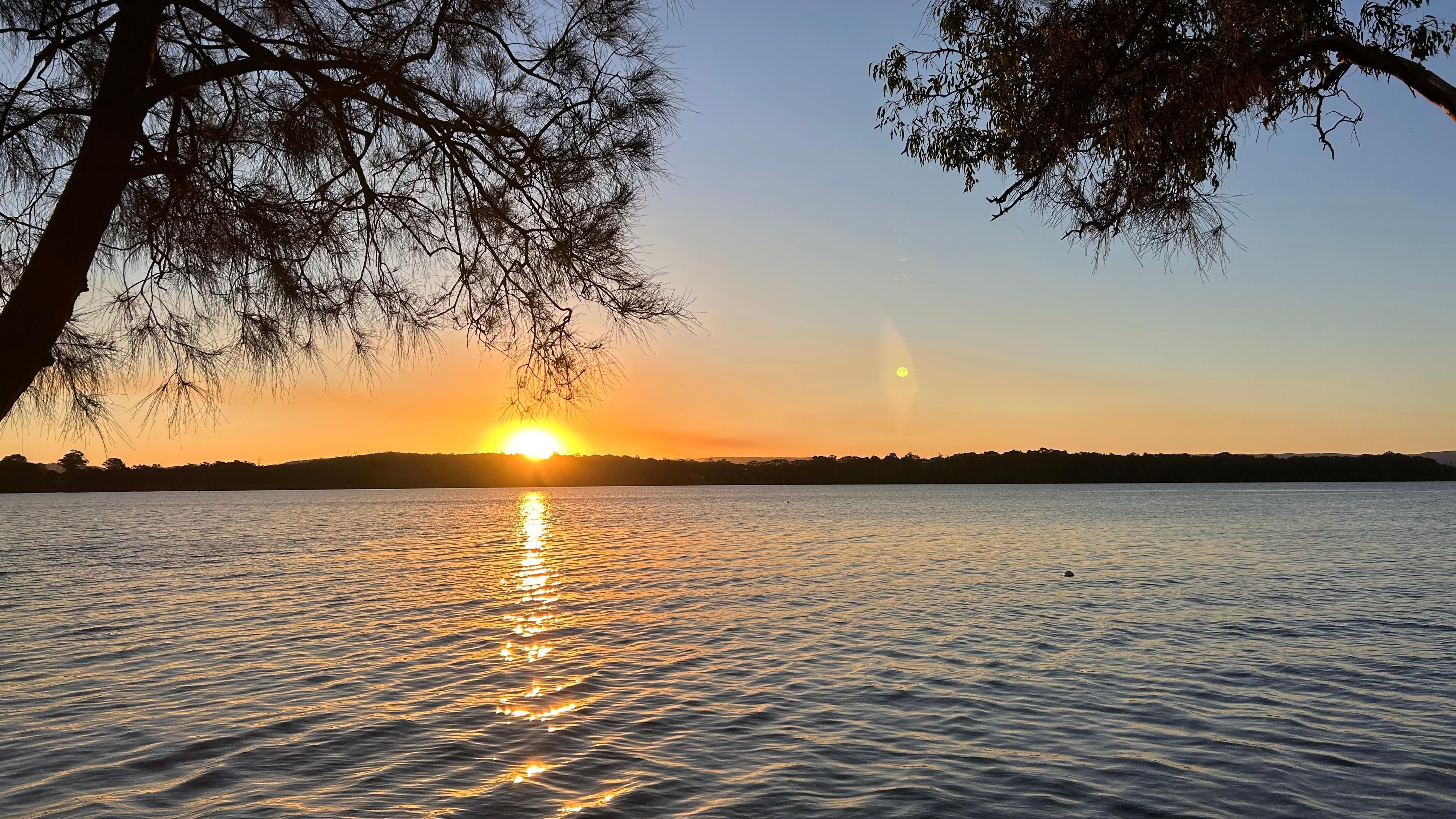 Beautiful sunset from the view of the house.