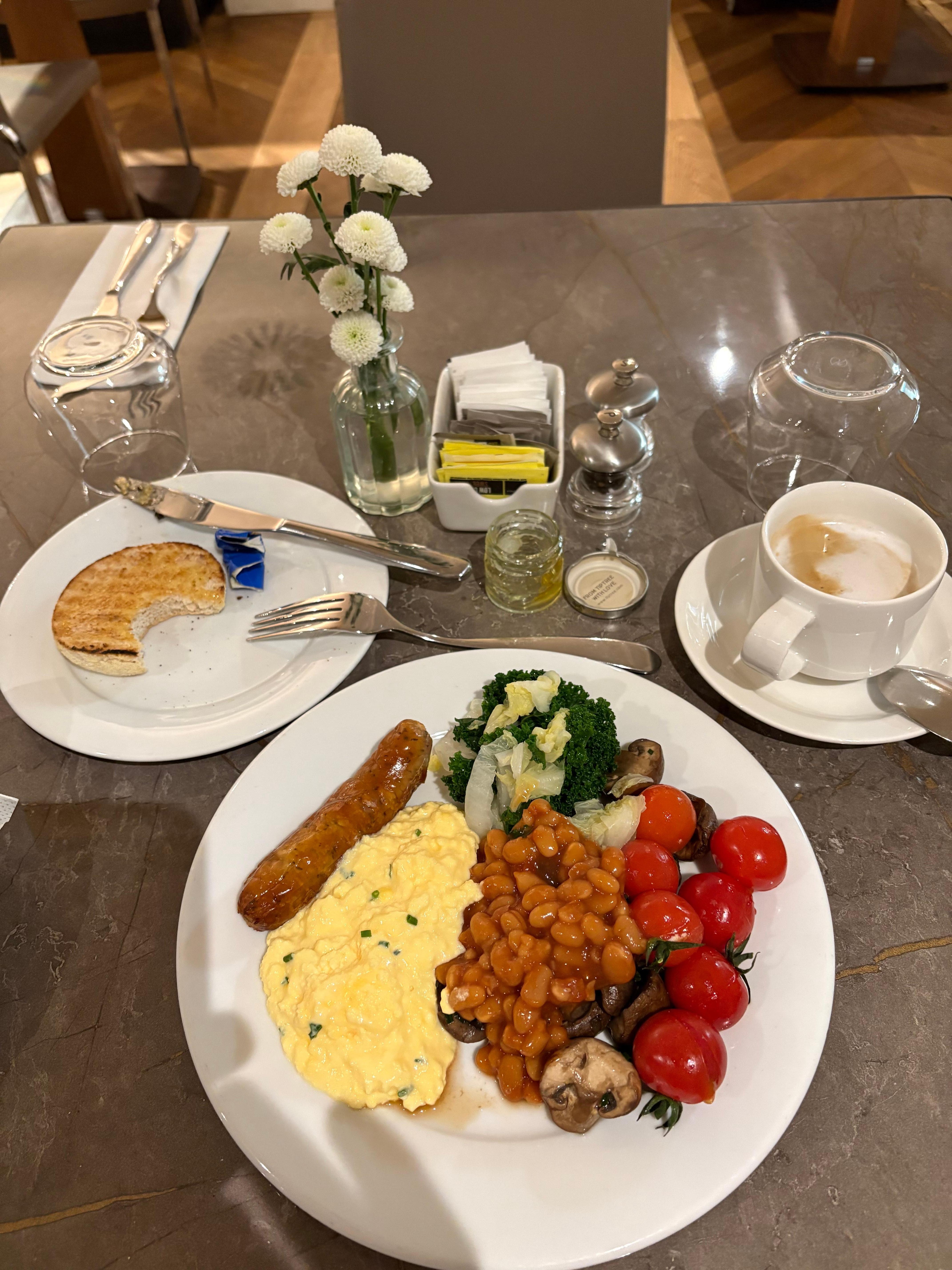 Selection from buffet. I’ve already polished off half the English muffin and all the orange marmalade.  Sautéed mushrooms peek out from beneath the baked beans and cherry tomatoes.  Still to follow are Greek yogurt with stewed prunes and fresh kiwi.