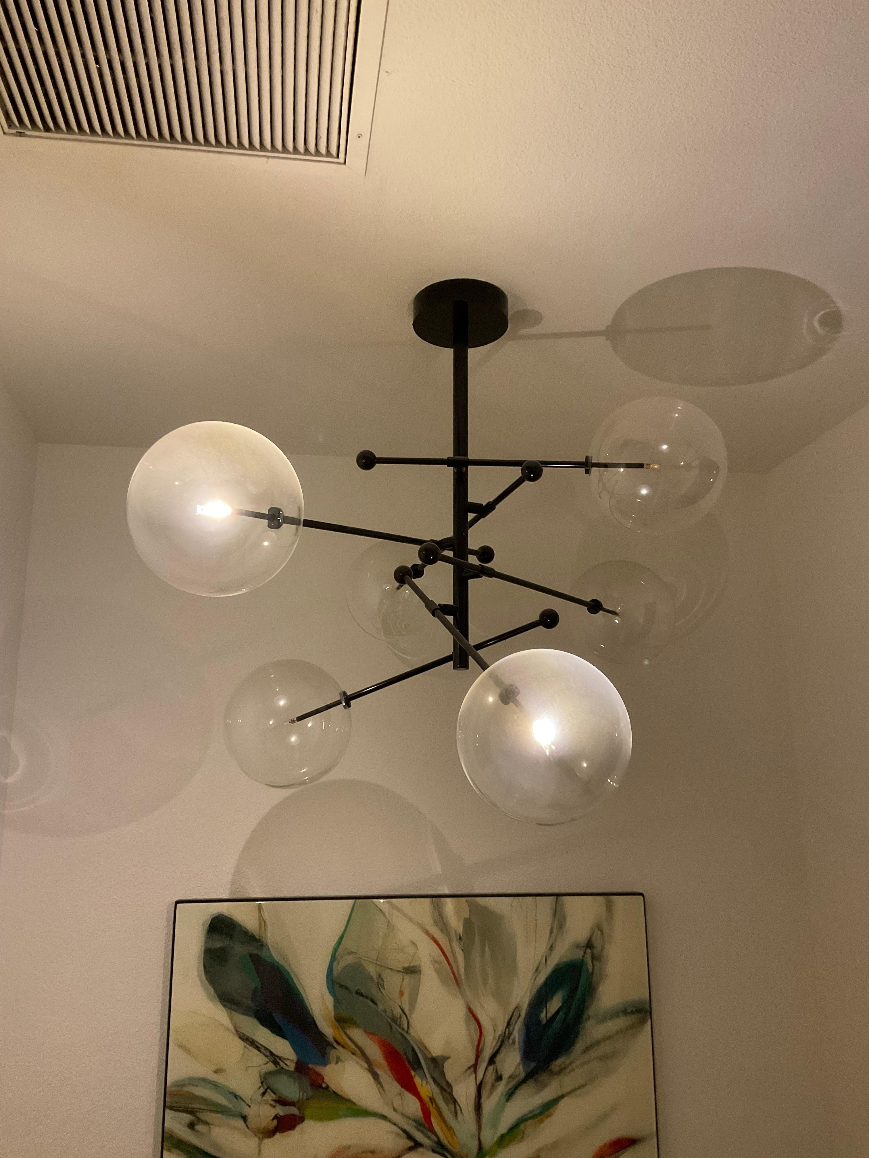 Dirty light fixture without light bulbs replaced 