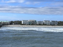 View from the pier looking back at thr condo, first building on the left in the photo
