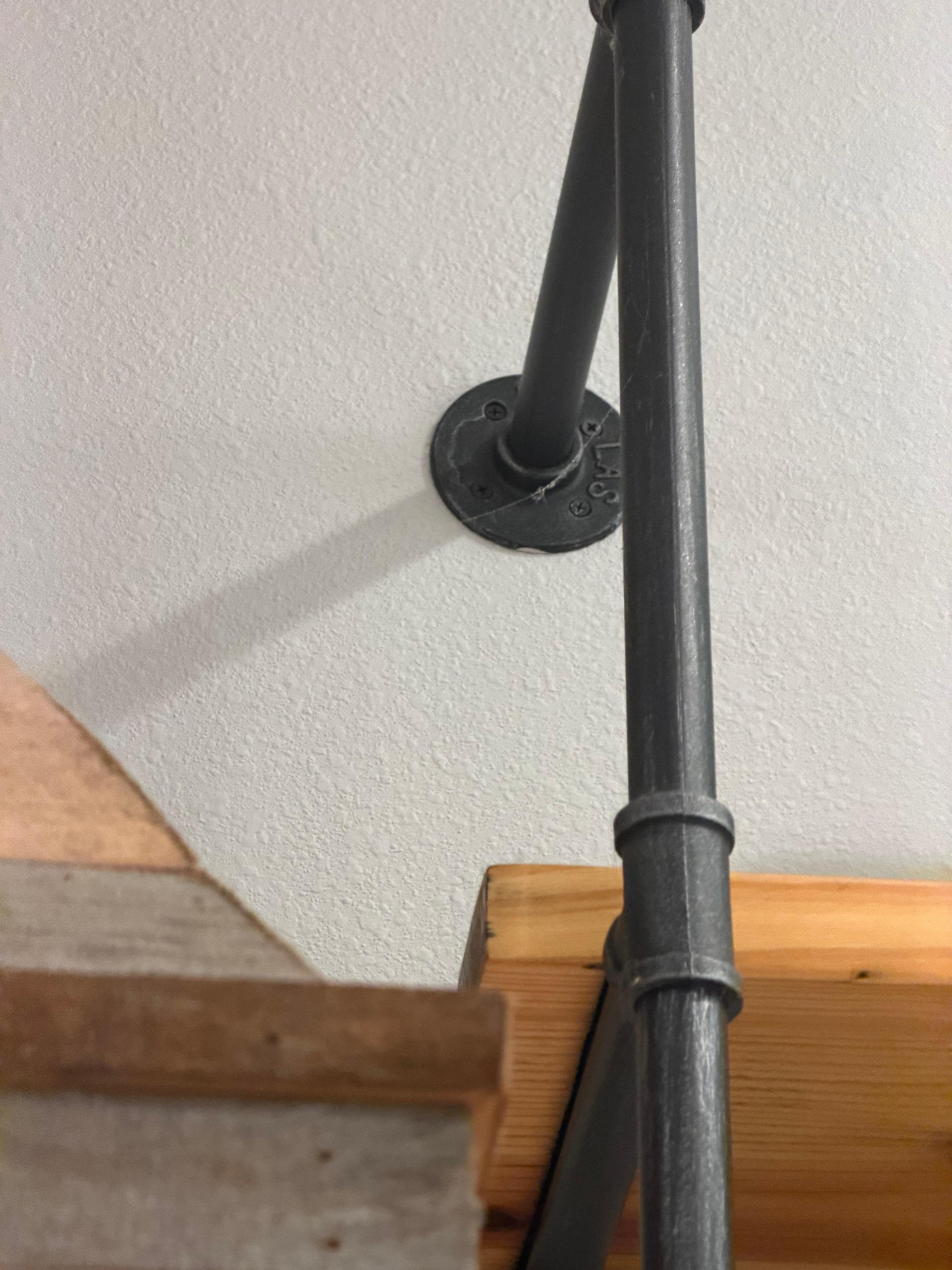 More webs from the spiders next to vent hood 