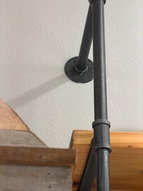 More webs from the spiders next to vent hood