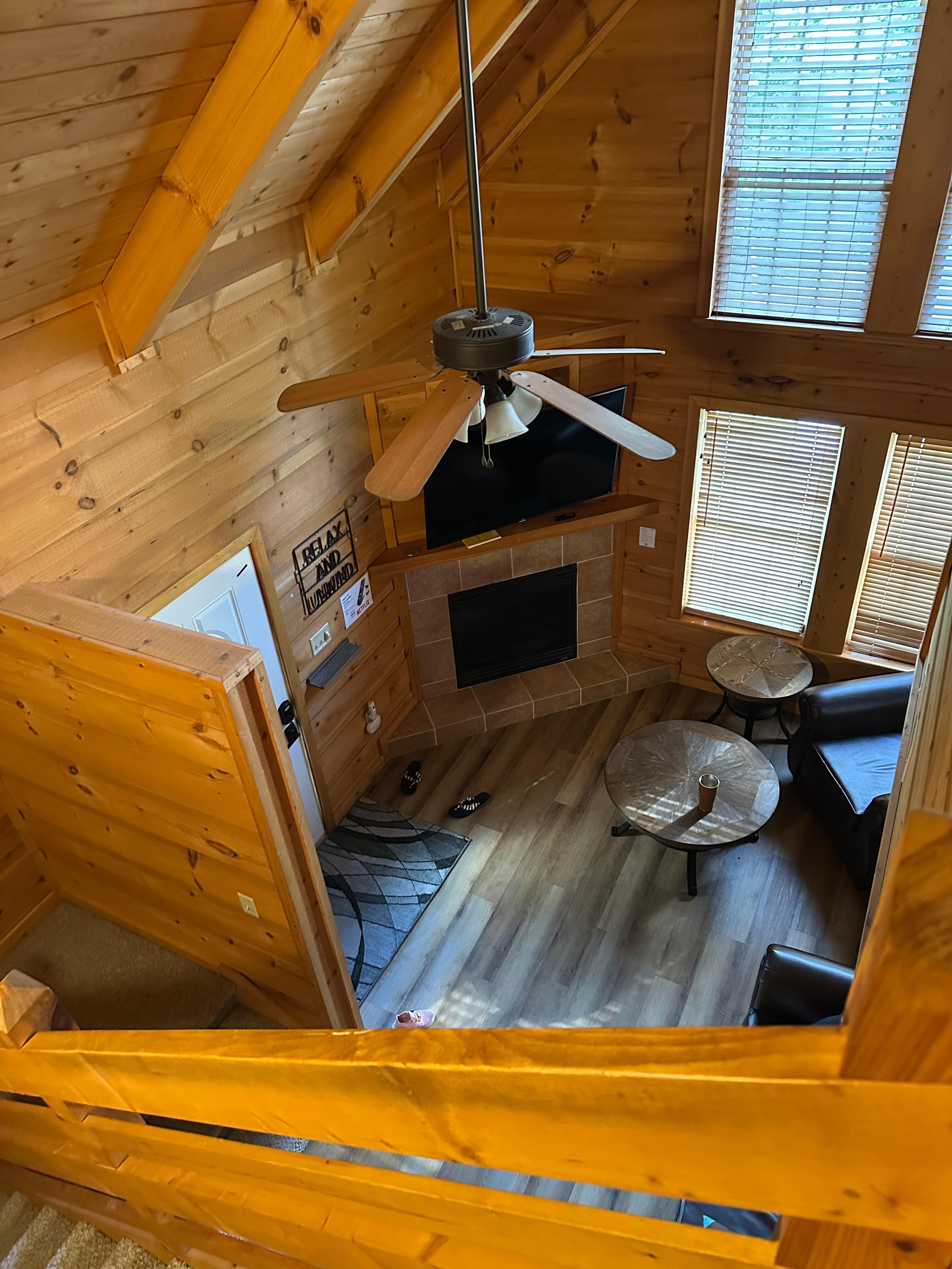 View of living room from stairwell. 