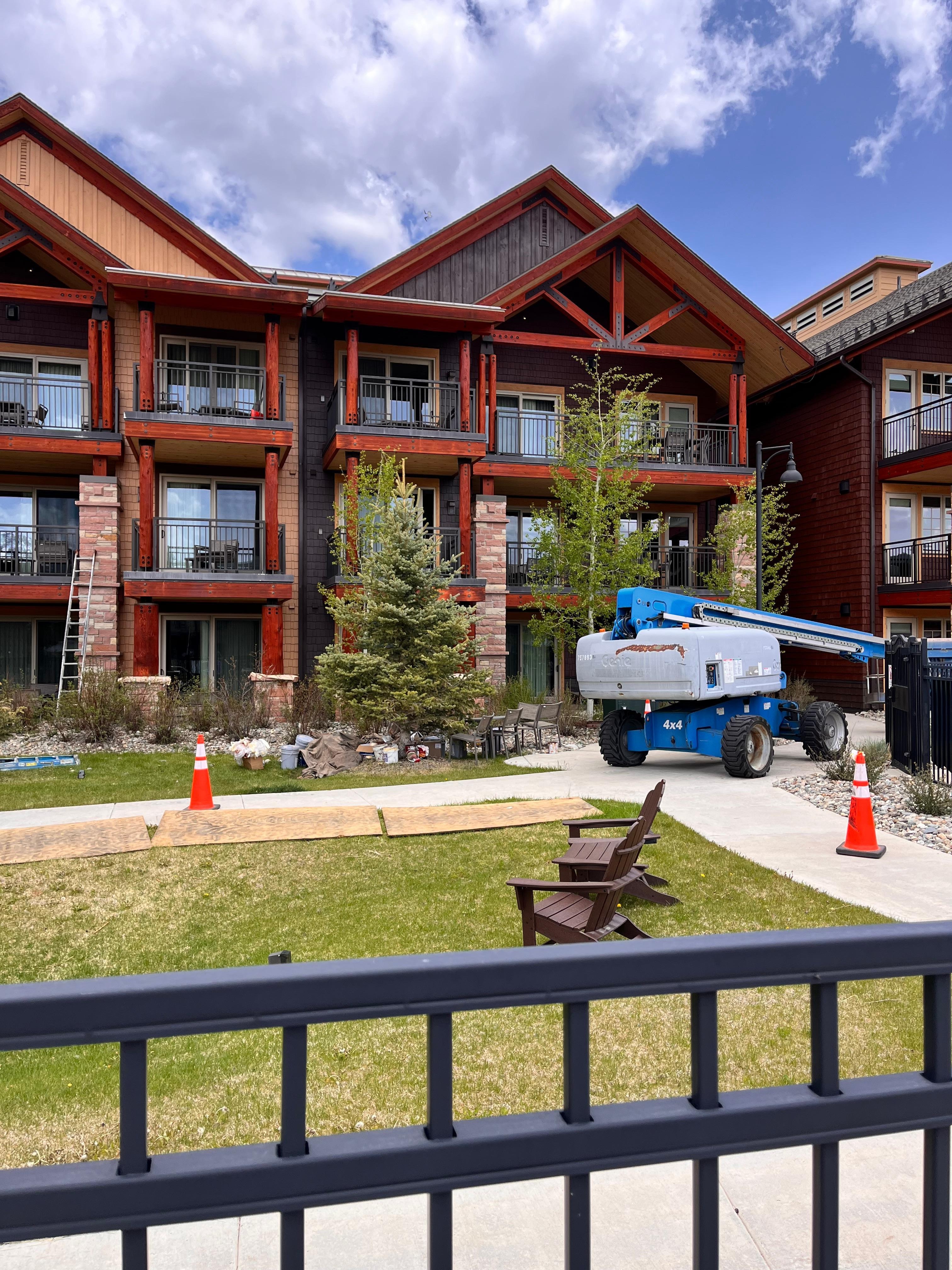 The crane is parked directly in front of our patio.
