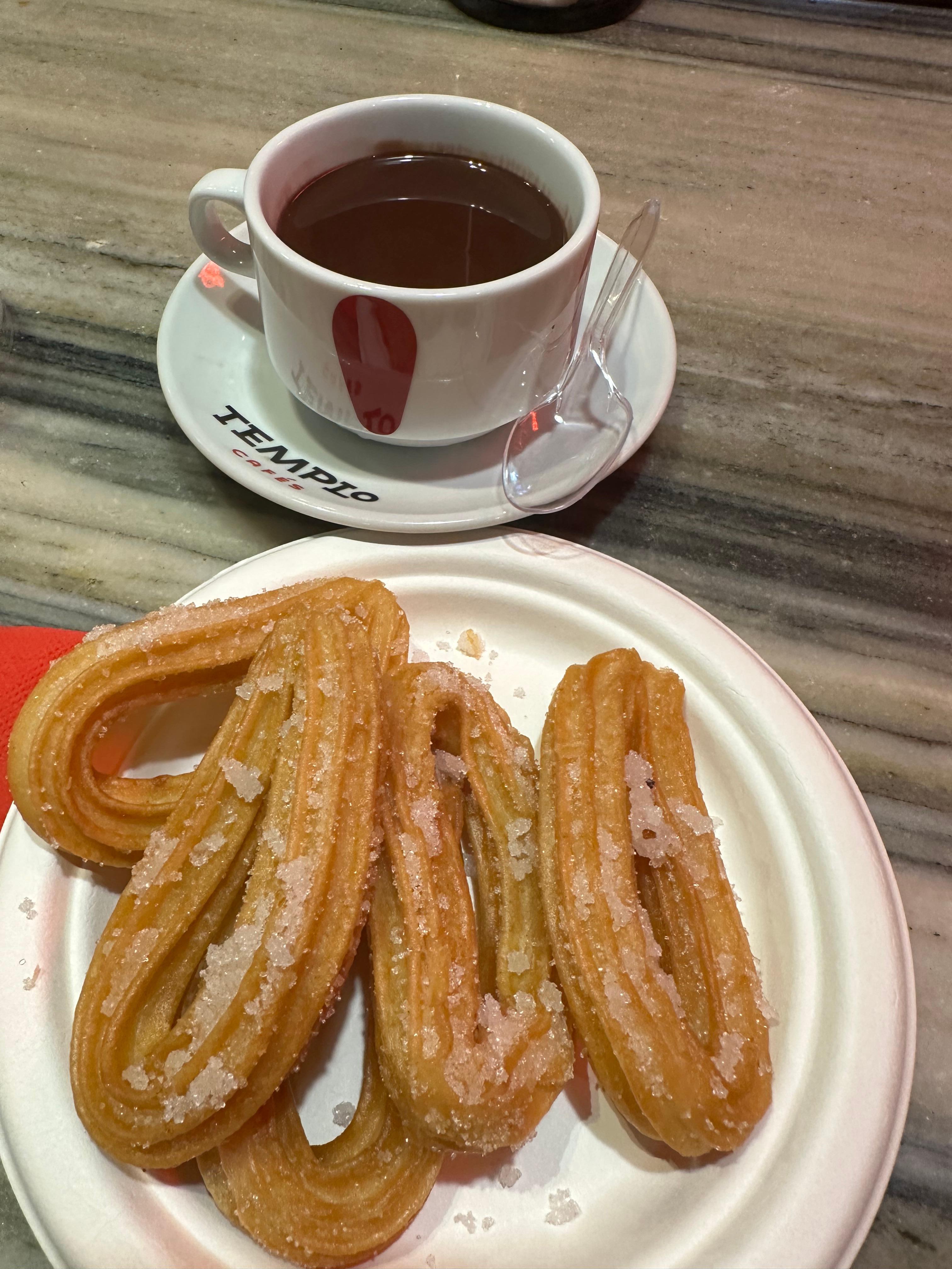 Churros with hot chocolate at the bar