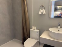 Bathroom with shower only but very well equipped.